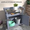 Outsunny Outdoor Potting Bench with Storage Cabinet Aluminum Tabletop Rubber Wheels for Patio Backyard Balcony Gray